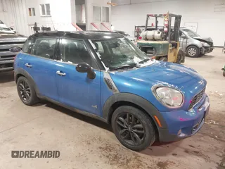 2013 MINI Countryman S ALL4 with VIN WMWZC5C59DWM16261, listed as a IAAI auction lot 41563270 with 159,516 mi miles and . Bid and sale history available at DreamBid. Image 1.