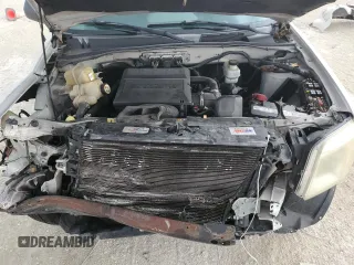 2009 Mercury Mariner with VIN 4M2CU81G49KJ16972, listed as a Copart auction lot 72354504 with 148,966 mi miles and Salvage title. Bid and sale history available at DreamBid. Image 14.