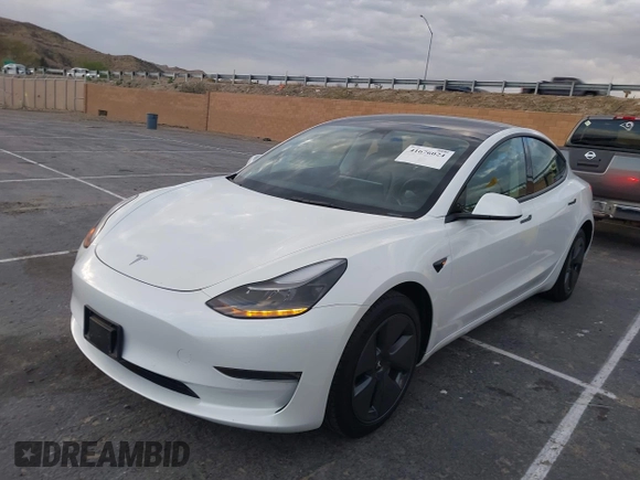 2022 Tesla Model 3 with VIN 5YJ3E1EA9NF375335, listed as a IAAI auction lot 41676024 with 18,836 mi miles. Bid and sale history available at carsss.com. Image 2.