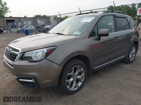 2017 Subaru Forester Touring z VIN JF2SJAWC6HH529707, wystawiony jako IAAI lot #42401138 z przebiegiem 172 868 mil mil oraz . Historia ofert i sprzedaży dostępna na DreamBid. Obrazek 2.
