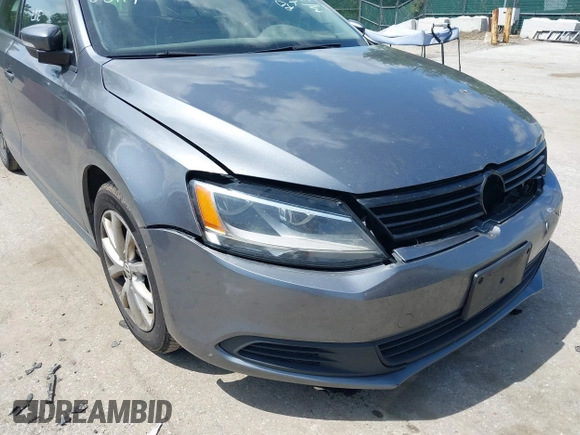2012 Volkswagen Jetta SE z VIN 3VWDP7AJ4CM323219, wystawiony jako IAAI lot #42290353 z przebiegiem 313 663 mil mil oraz . Historia ofert i sprzedaży dostępna na DreamBid. Obrazek 16.