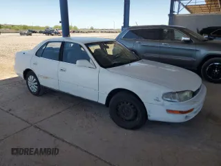 1994 Toyota Camry LE z VIN JT2GK12E4R0005313, wystawiony jako Copart lot #58034555 z przebiegiem 182 221 mil mil oraz Szkoda całkowita • Salvage title. Historia ofert i sprzedaży dostępna na DreamBid. Obrazek 4.