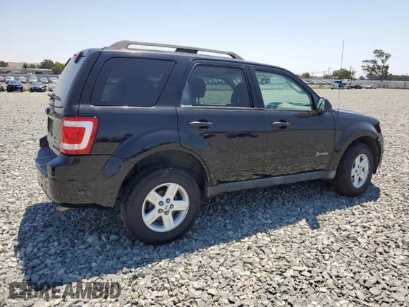2009 Ford Escape Hybrid with VIN 1FMCU49399KB39692, listed as a Copart auction lot 64418925 with 147,204 mi miles and Salvage title. Bid and sale history available at DreamBid. Image 3.
