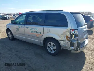 2010 Dodge Grand Caravan SXT with VIN 2D4RN5D19AR406197, listed as a IAAI auction lot 41854505 with 140,760 mi miles and . Bid and sale history available at DreamBid. Image 3.