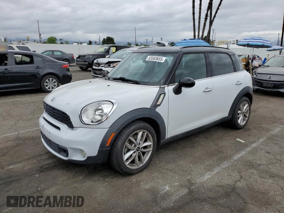 2013 MINI Countryman S with VIN WMWZC3C54DWP24877, listed as a Copart auction lot 53583655 with 97,734 mi miles and Salvage title. Bid and sale history available at DreamBid. Image 1.
