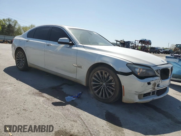 2011 BMW 7 Series 740i with VIN WBAKA4C50BC612878, listed as a Copart auction lot 52035635 with 192,248 mi miles and Salvage Title. Bid and sale history available at carsss.com. Image 4.