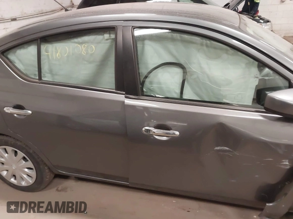 2018 Nissan Versa Sedan SV with VIN 3N1CN7AP7JL860195, listed as a IAAI auction lot 41801080 with 103,984 mi miles. Bid and sale history available at carsss.com. Image 14.