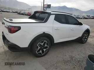 2023 Hyundai Santa Cruz Limited z VIN 5NTJEDAF8PH069811, wystawiony jako Copart lot #52806245 z przebiegiem 17 223 mil mil oraz Szkody całkowita. Historia ofert i sprzedaży dostępna na DreamBid. Obrazek 3.
