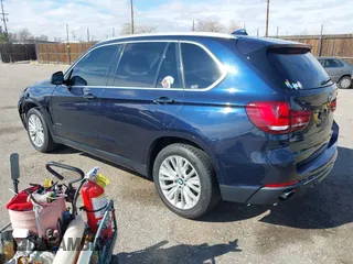 2016 BMW X5 xDrive35i with VIN 5UXKR0C54G0P19251, listed as a IAAI auction lot 41724798 with 87,824 mi miles. Bid and sale history available at carsss.com. Image 3.