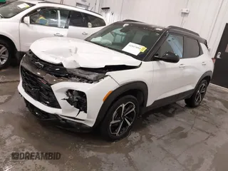 2023 Chevrolet TrailBlazer RS with VIN KL79MTSL1PB114699, listed as a IAAI auction lot 41847894 with 21,284 mi miles and . Bid and sale history available at DreamBid. Image 2.
