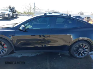 2021 Tesla Model Y Performance with VIN 5YJYGDEF9MF251738, listed as a IAAI auction lot 41708950 with 61,248 mi miles and . Bid and sale history available at DreamBid. Image 15.