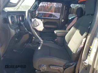 2022 Jeep Gladiator Willys with VIN 1C6HJTAG7NL117102, listed as a Copart auction lot 87679075 with 28,196 mi miles and Salvage title. Bid and sale history available at DreamBid. Image 7.
