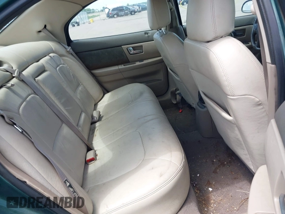 2000 Mercury Sable LS Premium z VIN 1MEFM55S4YA648211, wystawiony jako IAAI lot #42354578 z przebiegiem 72 686 mil mil oraz . Historia ofert i sprzedaży dostępna na DreamBid. Obrazek 8.