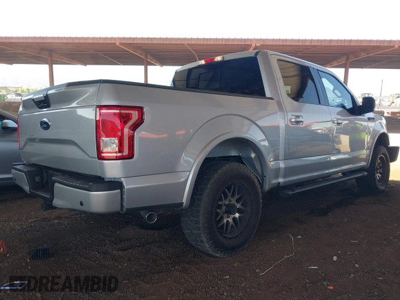 2015 Ford F-150 XLT with VIN 1FTEW1EF6FKD10853, listed as a IAAI auction lot 42312250 with 103,643 mi miles and . Bid and sale history available at DreamBid. Image 4.