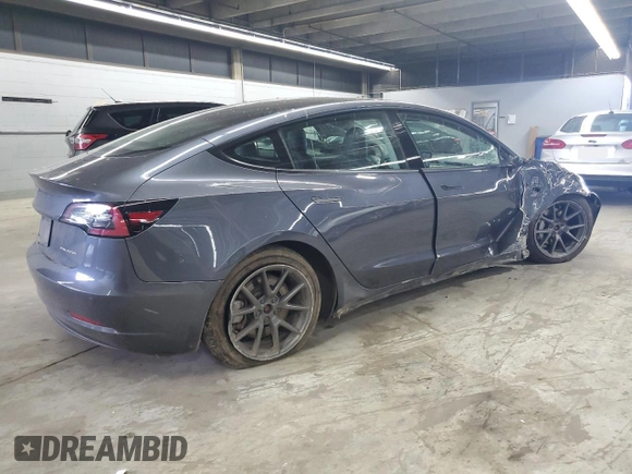 2021 Tesla Model 3 Long Range z VIN 5YJ3E1EB3MF848122, wystawiony jako Copart lot #56423005 z przebiegiem 57 619 mil mil oraz Szkoda całkowita • Salvage title. Historia ofert i sprzedaży dostępna na DreamBid. Obrazek 3.