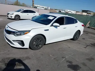 2020 Kia Optima LX with VIN 5XXGT4L38LG382915, listed as a IAAI auction lot 42015096 with 157,483 mi miles. Bid and sale history available at carsss.com. Image 14.
