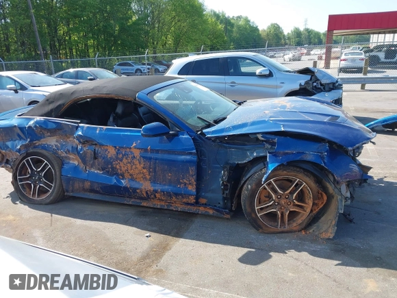 2022 Ford Mustang EcoBoost z VIN 1FATP8UH4N5102828, wystawiony jako IAAI lot #42073571 z przebiegiem 69 931 mil mil oraz . Historia ofert i sprzedaży dostępna na DreamBid. Obrazek 13.