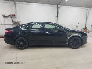 2016 Ford Fusion SE z VIN 3FA6P0T98GR111895, wystawiony jako IAAI lot #42633525 z przebiegiem 77 231 mil mil oraz . Historia ofert i sprzedaży dostępna na DreamBid. Obrazek 14.