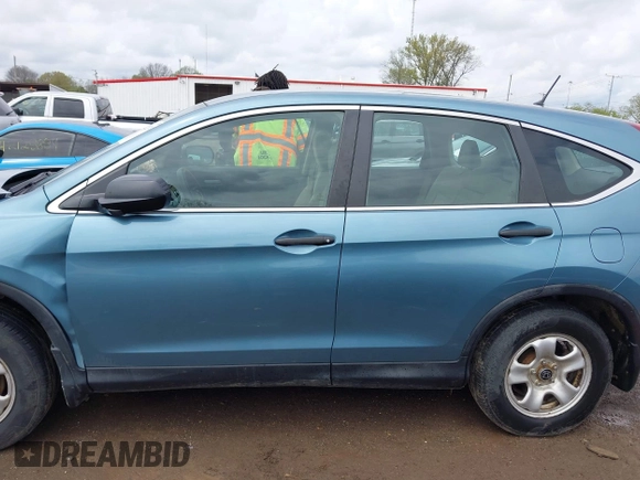 2015 Honda CR-V LX with VIN 2HKRM4H37FH601922, listed as a IAAI auction lot 42126743 with 165,764 mi miles and . Bid and sale history available at DreamBid. Image 14.