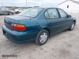 1998 Chevrolet Malibu with VIN 1G1ND52M8WY142896, listed as a IAAI auction lot 42074243 with 118,401 mi miles. Bid and sale history available at carsss.com. Image 4.