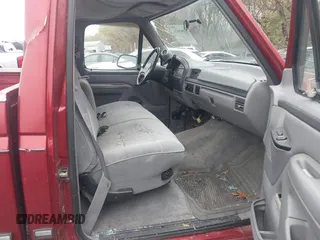 1997 Ford F-250 with VIN 1FTHF26H5VEB81858, listed as a IAAI auction lot 40865874 with 97,807 mi miles. Bid and sale history available at carsss.com. Image 5.