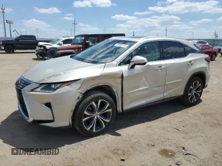 2016 Lexus RX 350 with VIN 2T2BZMCA2GC040148, listed as a Copart auction lot 56964115 with 124,869 mi miles and Salvage title. Bid and sale history available at DreamBid. Image 1.
