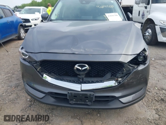 2017 Mazda CX-5 Touring z VIN JM3KFBCL4H0178747, wystawiony jako IAAI lot #42041380 z przebiegiem 112 083 mil mil oraz . Historia ofert i sprzedaży dostępna na DreamBid. Obrazek 12.