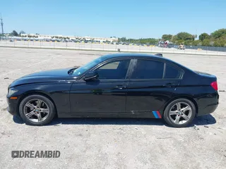 2015 BMW 3 Series 328i with VIN WBA3C1C58FK123489, listed as a IAAI auction lot 42026400 with 127,880 mi miles and . Bid and sale history available at carsss.com. Image 14.