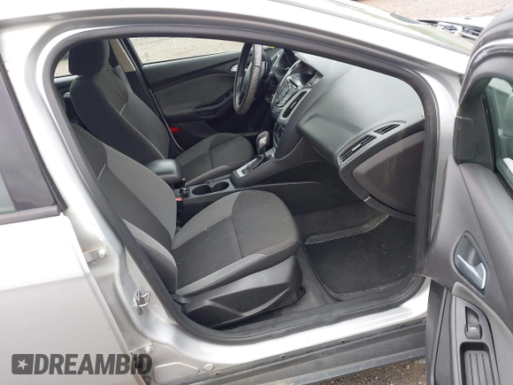 2013 Ford Focus SE z VIN 1FADP3F25DL113699, wystawiony jako IAAI lot #42308712 z przebiegiem 137 312 mil mil oraz . Historia ofert i sprzedaży dostępna na DreamBid. Obrazek 5.