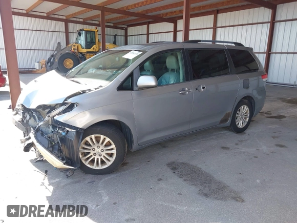 2013 Toyota Sienna XLE AAS with VIN 5TDYK3DC3DS297044, listed as a IAAI auction lot 42552470 with 143,947 mi miles and . Bid and sale history available at DreamBid. Image 2.
