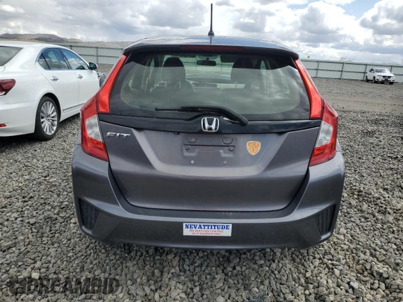 2016 Honda Fit LX z VIN JHMGK5H56GS010373, wystawiony jako Copart lot #51334255 z przebiegiem 96 212 mil mil oraz Szkoda całkowita • Salvage title. Historia ofert i sprzedaży dostępna na DreamBid. Obrazek 6.