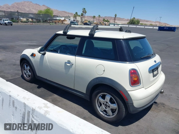 2010 MINI Hardtop with VIN WMWMF3C53ATZ25765, listed as a IAAI auction lot 42314587 with 107,677 mi miles and . Bid and sale history available at DreamBid. Image 3.