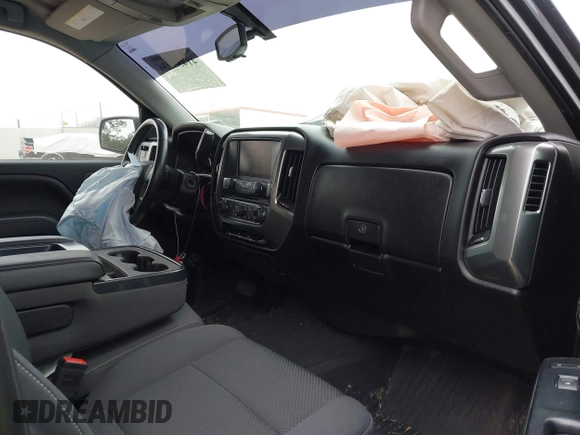 2018 Chevrolet Silverado 1500 LT with VIN 3GCPCREC1JG497019, listed as a IAAI auction lot 41459936 with 52,691 mi miles and . Bid and sale history available at DreamBid. Image 5.