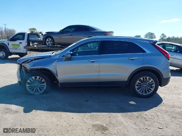 2025 Cadillac XT4 AWD Premium Luxury with VIN 1GYFZDR48SF138618, listed as a IAAI auction lot 41889219 with NaN miles. Bid and sale history available at carsss.com. Image 14.