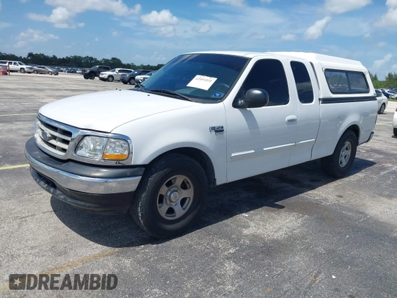 2003 Ford F-150 XL with VIN 1FTRX17W53NA40472, listed as a IAAI auction lot 42491035 with Not provided miles and . Bid and sale history available at DreamBid. Image 2.