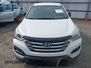 2014 Hyundai Santa Fe z VIN 5XYZTDLB1EG197765, wystawiony jako IAAI lot #41999374 z przebiegiem 172 430 mil mil oraz . Historia ofert i sprzedaży dostępna na DreamBid. Obrazek 6.