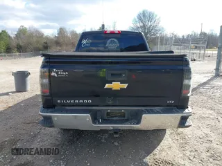 2014 Chevrolet Silverado 1500 LTZ with VIN 1GCVKSEC1EZ105678, listed as a IAAI auction lot 41299817 with 142,014 mi miles and . Bid and sale history available at DreamBid. Image 16.