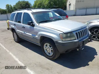2004 Jeep Grand Cherokee Laredo with VIN 1J4GW48S04C431060, listed as a IAAI auction lot 42709918 with 187,629 mi miles and . Bid and sale history available at DreamBid. Image 1.