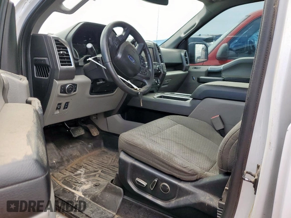 2015 Ford F-150 XL with VIN 1FTEW1CP2FKE23839, listed as a Copart auction lot 54577605 with 131,025 mi miles and Salvage title. Bid and sale history available at DreamBid. Image 7.