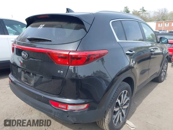 2017 Kia Sportage EX z VIN KNDPNCAC9H7152016, wystawiony jako IAAI lot #42082483 z przebiegiem 87 539 mil mil oraz . Historia ofert i sprzedaży dostępna na DreamBid. Obrazek 4.