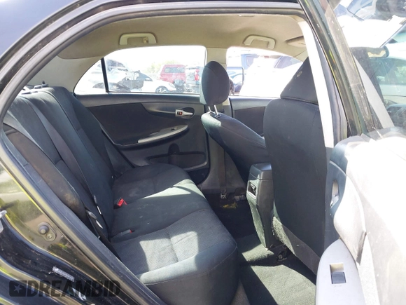 2010 Toyota Corolla with VIN 1NXBU4EE2AZ299148, listed as a IAAI auction lot 41884899 with 303,174 mi miles. Bid and sale history available at carsss.com. Image 8.
