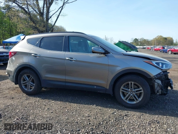 2018 Hyundai Santa Fe 2.4L z VIN 5NMZUDLB7JH077241, wystawiony jako IAAI lot #42135854 z przebiegiem 59 819 mil mil oraz . Historia ofert i sprzedaży dostępna na DreamBid. Obrazek 13.