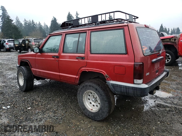 1999 Jeep Cherokee SE with VIN 1J4FF28S9XL645291, listed as a Copart auction lot 87064124 with Not provided miles and Salvage title. Bid and sale history available at DreamBid. Image 2.