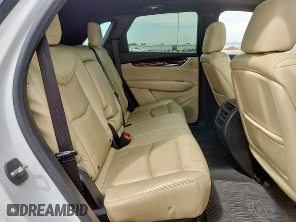 2017 Cadillac XT5 Luxury FWD z VIN 1GYKNBRSXHZ141251, wystawiony jako Copart lot #63387705 z przebiegiem 226 730 mil mil oraz Szkoda całkowita • Salvage title. Historia ofert i sprzedaży dostępna na DreamBid. Obrazek 11.