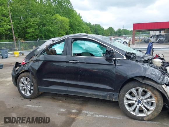 2020 Ford Edge Titanium z VIN 2FMPK4K98LBB12684, wystawiony jako IAAI lot #42134532 z przebiegiem 103 786 mil mil oraz . Historia ofert i sprzedaży dostępna na DreamBid. Obrazek 13.