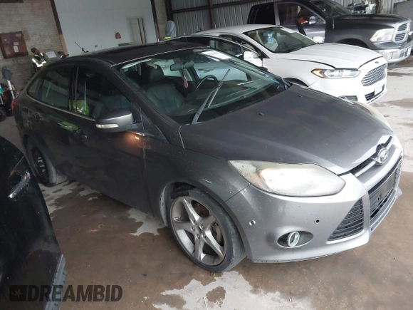 2013 Ford Focus Titanium with VIN 1FADP3J20DL189239, listed as a IAAI auction lot 42122324 with 116,917 mi miles and . Bid and sale history available at carsss.com. Image 1.