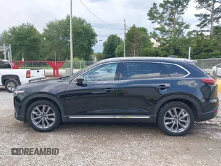 2022 Mazda CX-9 Grand Touring with VIN JM3TCBDYXN0627657, listed as a IAAI auction lot 42498856 with 61,044 mi miles and . Bid and sale history available at DreamBid. Image 14.