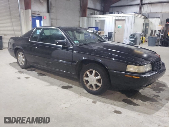 2000 Cadillac Eldorado Touring ETC z VIN 1G6ET1294YU144883, wystawiony jako Copart lot #80979854 z przebiegiem 89 271 mil mil oraz Czysty tytuł • Clean title. Historia ofert i sprzedaży dostępna na DreamBid. Obrazek 4.