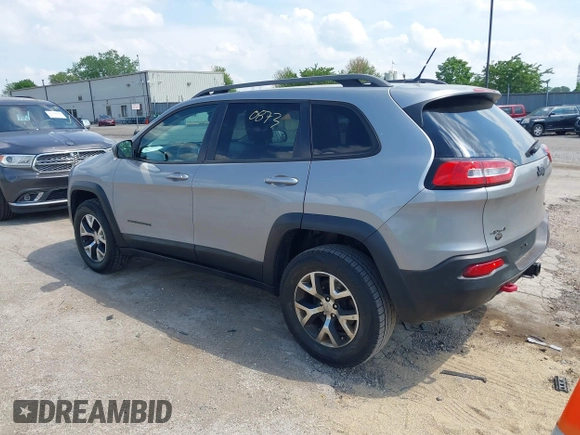 2015 Jeep Cherokee Trailhawk z VIN 1C4PJMBS5FW615313, wystawiony jako IAAI lot #42250873 z przebiegiem 148 008 mil mil oraz . Historia ofert i sprzedaży dostępna na DreamBid. Obrazek 3.