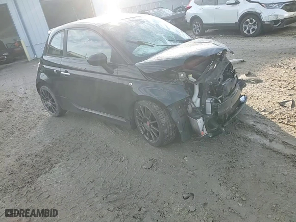 2015 FIAT 500 Abarth with VIN 3C3CFFFHXFT513994, listed as a Copart auction lot 82547154 with 67,923 mi miles and Salvage Title. Bid and sale history available at carsss.com. Image 10.